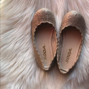 Gold Glittery flats.